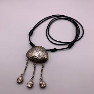 Vintage Sterling Silver hammered pendant with black adjustable cord